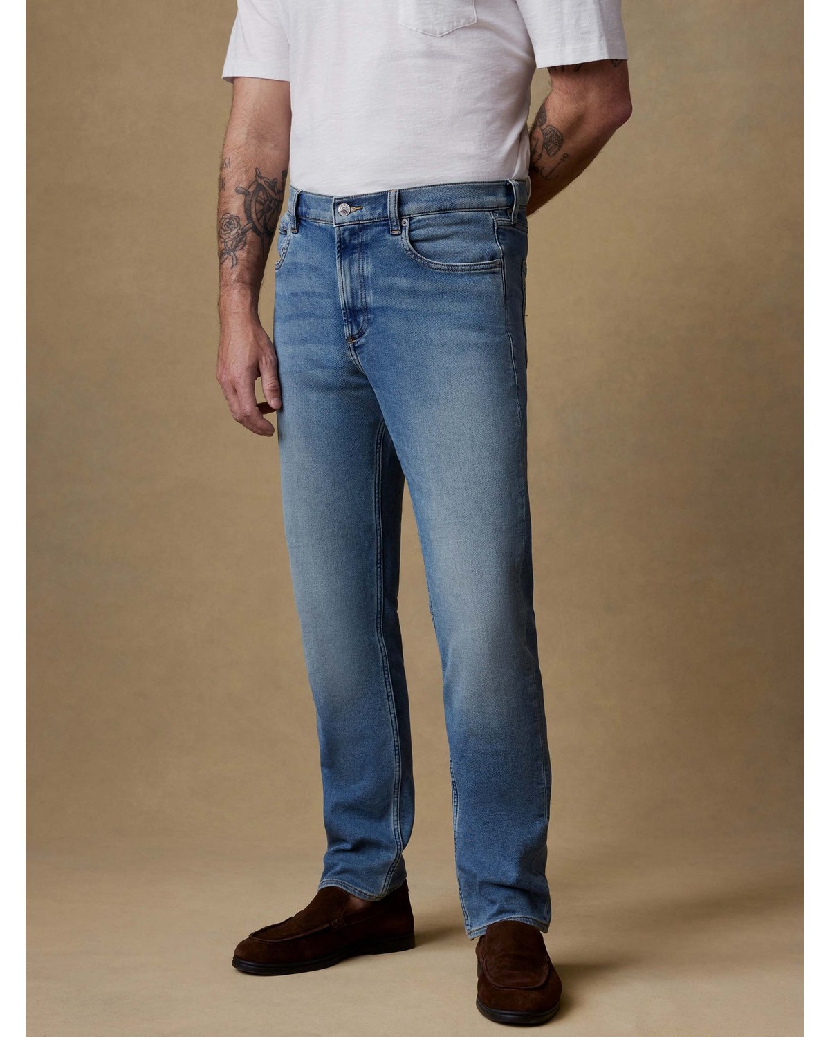 Faherty Stretch Terry Indigo five pocket pant in an indigo ocean wash